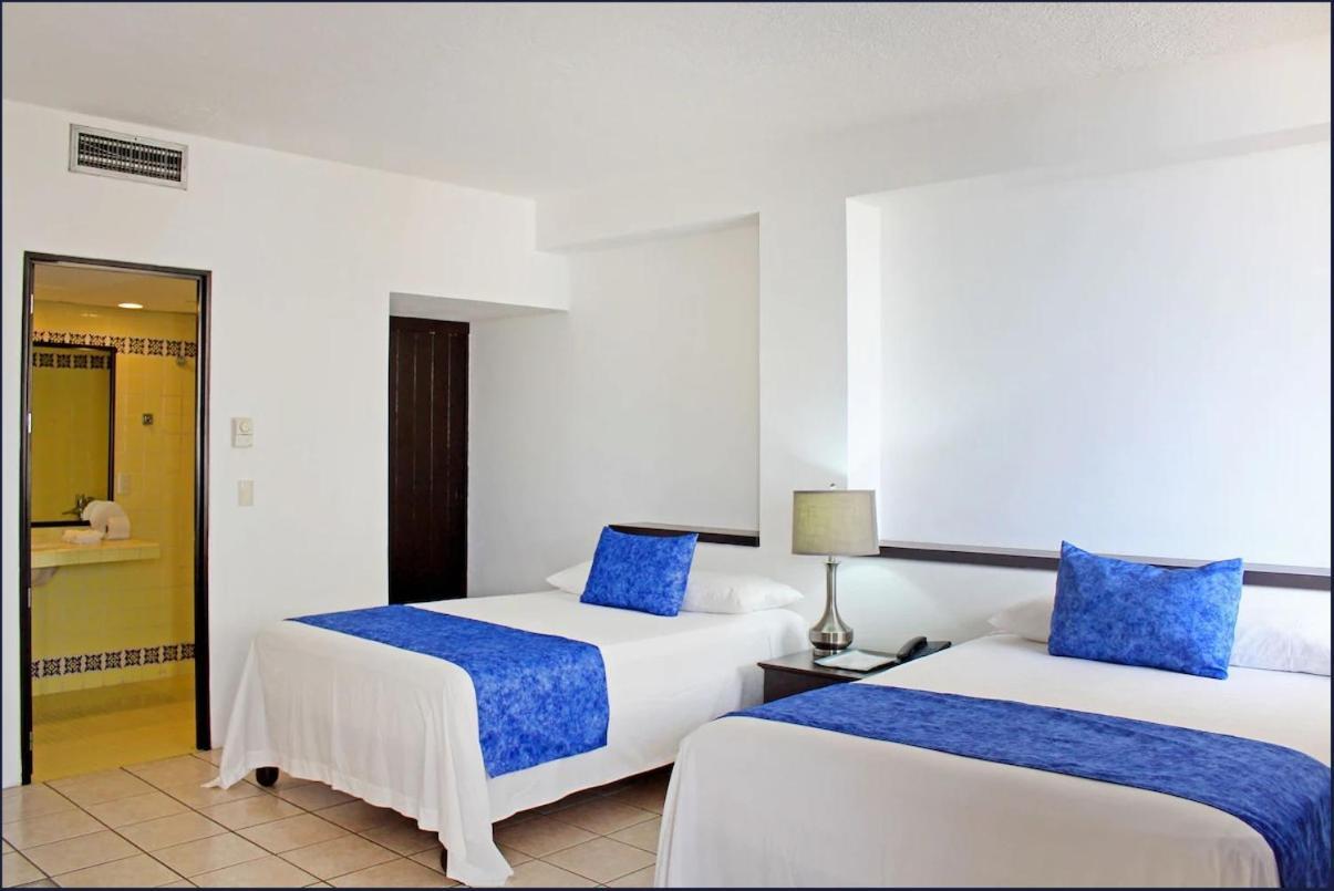 Hotel Delfin Vista Pier Beach Front ปูแอร์โตบาญาร์ตา ภายนอก รูปภาพ